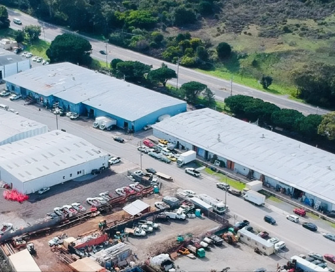 Aerial view of the Industrial Way warehouses and the adjacent creek